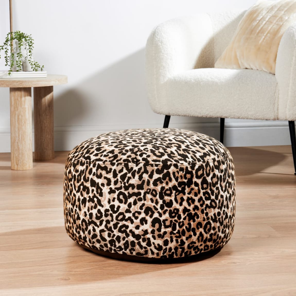 434431-home-collection-animal-print-inflateable-foot-stool-leopard