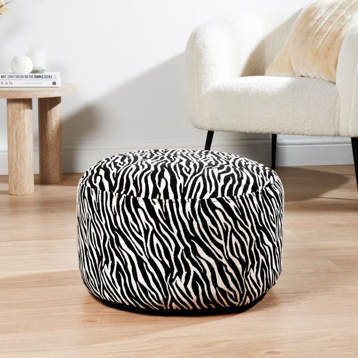 434431-home-collection-animal-print-inflateable-foot-stool-zebra