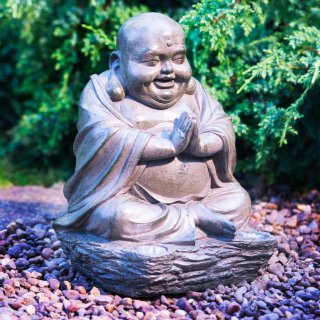 393267-353668-Stone-Buddha-garden-ornament-daylight