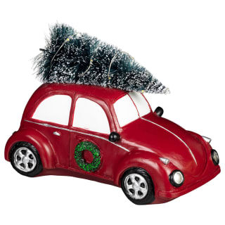 425932-red-car-with-light-up-tree1