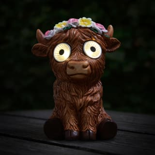429683-solar-powered-big-eyed-highland-cow-3